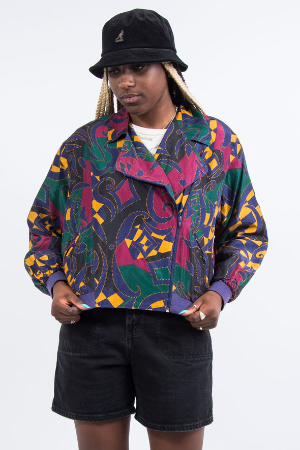 UK Fashion. The best in UK vintage fashion. Shop patterned shirts right now on our online vintage clothing store | THE VINTAGE SCENE.Vintage 90's Multicolour Silk Bomber Jacket