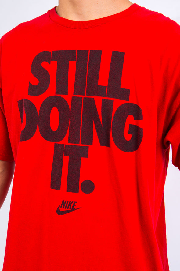 Nike "Still Doing It" Graphic Print T-Shirt
